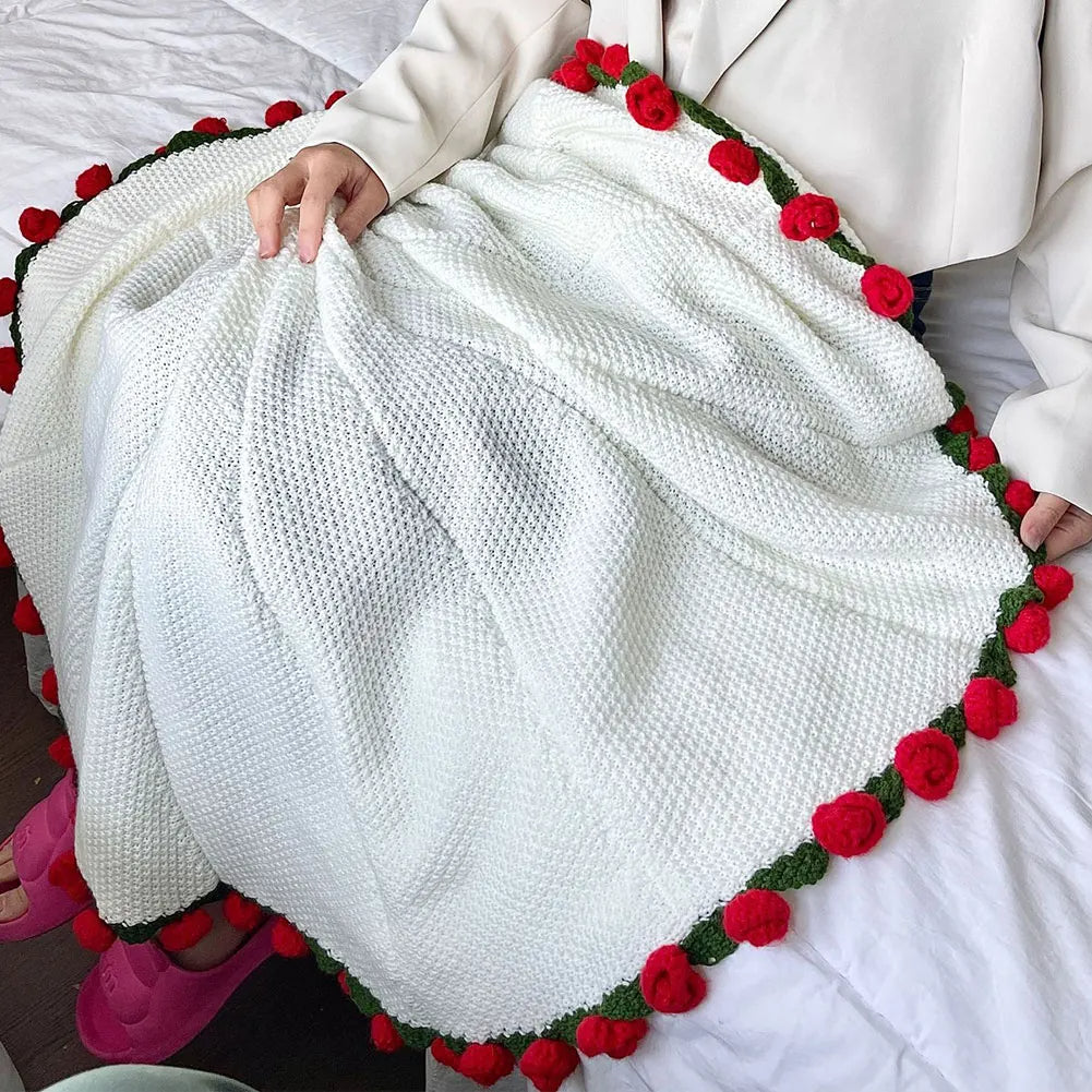 Häkeldecke mit Rosenstrauß