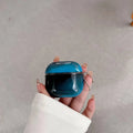 Leuchtende AirPods-Hülle mit Treibsand-Effekt